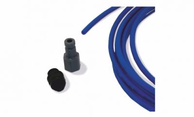 Conversion kit for converting the water connection from Testomat BOB to Testomat 808, front view with individual parts, consisting of plug nipple, pipe and screw-in connector